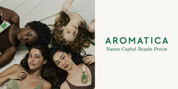 Cztery kobiety o różnej urodzie z naturalną cerą i włosami prezentują produkty Aromatica. Widoczne krem i olejek.