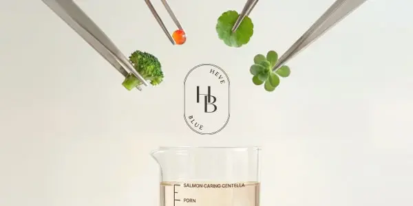 HEVE BLUE: tweezers add broccoli, red berry, and leaves to a beaker of 'Salmon Caring Centella' skincare liquid.