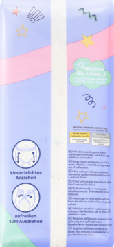 Tył fioletowego opakowania pieluchomajtek Babydream Maxi 9-15kg, 22 szt., z instrukcjami użycia.
