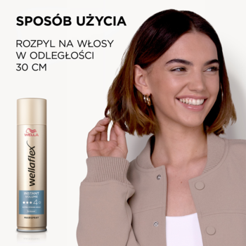 Złoty lakier Wellaflex 2nd Day Volume, obok uśmiechnięta kobieta, prezentuje naturalną objętość włosów. Widoczna instrukcja użycia.