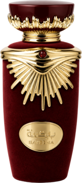 Perfumy Lattafa Bayeena w bordowej, aksamitnej butelce ze złotym, rzeźbionym zdobieniem i czerwonym kamieniem.