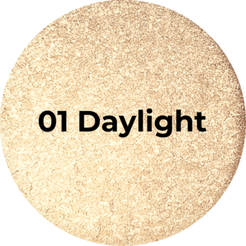 Okrągły złoty rozświetlacz Airglow 01 Daylight, intensywnie lśniący, z widocznym napisem, zbliżenie.