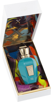Woda perfumowana unisex Xerjoff Erba Pura: turkusowa butelka ze złotą nakrętką w otwartym pudełku z barwnym wnętrzem.