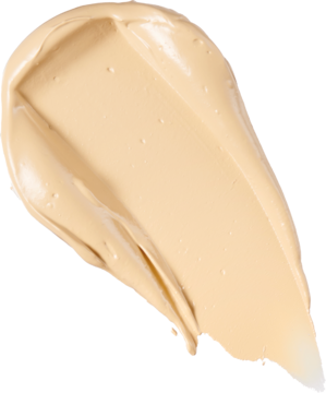 Jasno beżowy, kremowy swatch korektora Revolution Conceal&Define C5.7. Gęsta, gładka smuga produktu na białym tle.