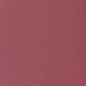 Wkład IsaDora Perfect Moisture Lipstick 15 Heather. Zbliżenie na jednolity, kremowy, ciemnoróżowy odcień.