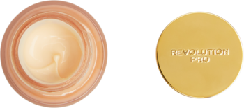 Z góry: otwarty słoiczek kremu Revolution Pro Miracle Eye Cream z beżową formułą, obok złota zakrętka.