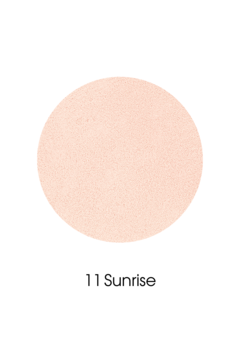 Okrągły swatch kremowego rozświetlacza Pastel Daylight nr 11 Sunrise, jasny beżowo-brzoskwiniowy z połyskiem.