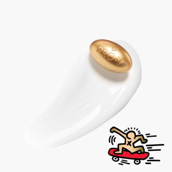 Pantene Pro-V Keratin Protect maska do włosów: złota kapsułka Pro-V na białym kremie, z motywem Keitha Haringa na desce.