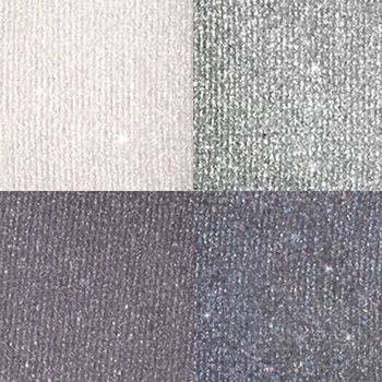 Zbliżenie czterech połyskujących tekstur palety cieni IsaDora Crystal Mauve: beż, srebro, fiolet i grafit.