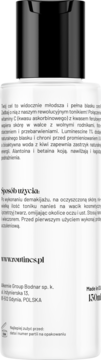 Tył białej butelki toniku z witaminą C, widok z bliska. Czytelny opis składu i zastosowania produktu.