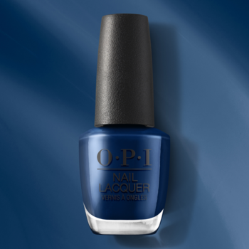 OPI Nail Lacquer IndiGO off, ciemnoniebieski lakier w szklanej butelce z czarnym korkiem, błyszczące wykończenie, na tle cieni.