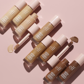 ELF Halo Glow Liquid Filter: sześć butelek rozświetlacza w płynie, odcienie od beżowego po brąz, na różowym tle.