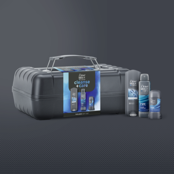 Zestaw Dove Men+Care Clean Comfort dla mężczyzn w ciemnoszarej skrzynce, obok srebrny spray, sztyft i żel.