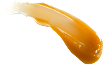 Gęsta, złocista próbka nawilżającej maski I'm From Honey Mask, kremowy smug na białym tle.