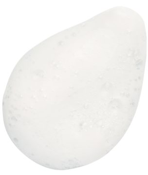 Zbliżenie na puszystą, białą kroplę rozświetlającej pianki Lumene Kirkas do mycia twarzy.