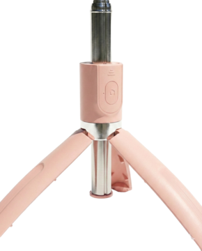 Różowy, składany statyw tripod do smartfona ze srebrnymi detalami, widok od dołu na rozłożone nogi.