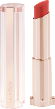 Koralowa pomadka Lancôme Idôle Squalane-12 Butterglow, otwarta, w błyszczącej miedzianej tubce, z przezroczystą zatyczką.