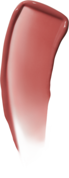 Close-up of a rich, glossy terracotta liquid lipstick swatch, showing its smooth, tapering application.