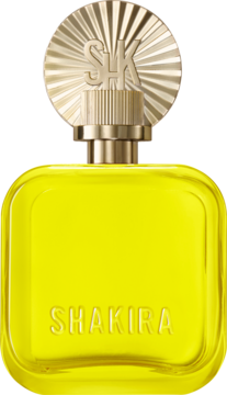 Perfumy Shakira, żółta butelka z wytłoczonym napisem i złotą nakrętką SHK w kształcie słońca, widok z przodu.
