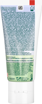 Tył białej tubki pasty do zębów dla dzieci z zielonymi napisami, składem, kodem QR i symbolami recyklingu.