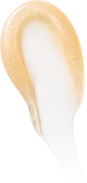 Zbliżenie na błyszczący, brzoskwiniowy swatch peptydowego balsamu Peach Ice Tea na białym tle.