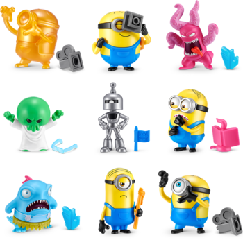 Zbiór 8 figurek z Gumi Yum Surprise Minionki: 5 Minionków, złota postać, różowy potwór, zielony i niebieski stwór.