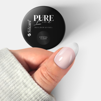 Czarny słoiczek Silcare Pure Line Builder UV Gel Crystal Clear obok dłoni z paznokciem typu french.