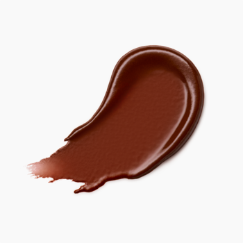 Catrice Bare Glow 020 Warm Mahogany balsam do ust, smuga ciepłego, błyszczącego brązu na białym tle, półtransparentne wykończenie.