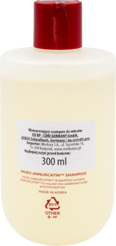 Tylny widok białej butelki szamponu Moev Annurcatin™ wzmacniającego włosy, z czerwoną nakrętką i etykietą 300 ml.