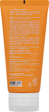 Tył pomarańczowej tubki Hanskin Cleansing Foam BHA 120ml na zaskórniki, z białą nakrętką.