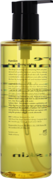 Tył butelki Hanskin Pore Cleansing Oil PHA. Żółty olejek, czarny dozownik, etykieta z angielskim opisem.