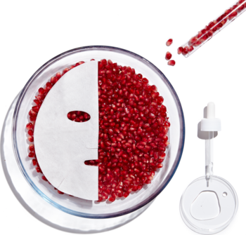 Garnier Maska Aqua Bomb z granatem: biała maska na ziarenkach granatu w misie, z pipetą i tubką nasion.