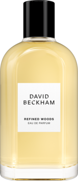 David Beckham Refined Woods męska woda perfumowana, butelka z bursztynowym płynem i czarnym korkiem, widok z przodu.