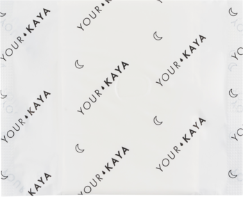 Biały, półprzezroczysty papier pakowy z logo Your Kaya i czarnymi symbolami księżyca, widok z góry.