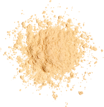 Puder sypki Revolution Baking Powder Banana, jasnobeżowa kupka proszku, widok z góry, z rozproszonymi cząstkami.