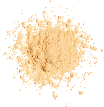 Puder sypki Revolution Baking Powder Banana, jasnobeżowa kupka proszku, widok z góry, z rozproszonymi cząstkami.