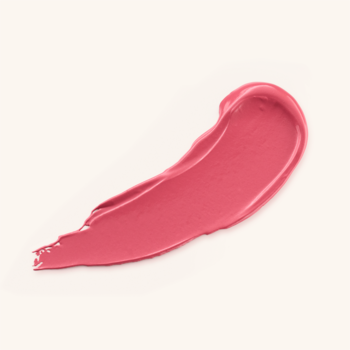 Cheek Flirt róż w sztyfcie, zbliżenie na kremowy, różowo-koralowy swash, gładkie wykończenie, bez brokatu.