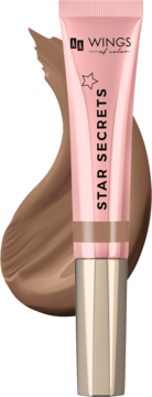 Bronzer Wings of Color Star Secrets 02 Medium Bronze w różowej tubce ze złotą nakrętką, z brązową plamą produktu obok.