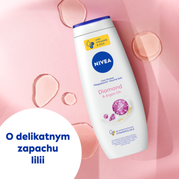 NIVEA Diamond & Argan Oil żel pod prysznic o zapachu lilii, biała butelka z niebieskim korkiem, na różowym tle.