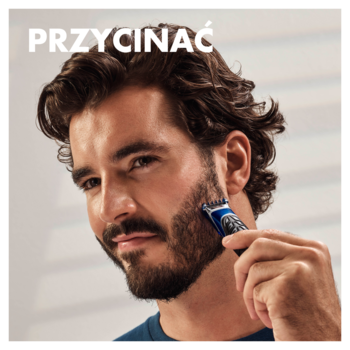 Mężczyzna przycina brodę maszynką Gillette Styler 4 w 1, widocznym tekstem "PRZYCINAĆ", zbliżenie na twarz.