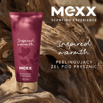 Zbliżenie na bordowy peelingujący żel MEXX Inspired Warmth w tubce ze złotą nakrętką, na tle drewna.
