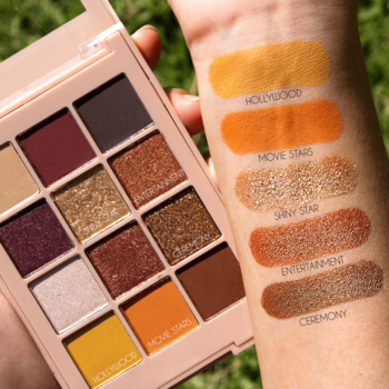 Paleta cieni J.Cat X-treme Access Pocket Shadow Walk of Stardom, 12 ciepłych odcieni, ze swatchami na ręce.