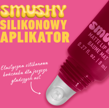 Smushy Matte Lip Balm, zbliżenie na otwarty różowy balsam z miękkim silikonowym aplikatorem na różowym tle.