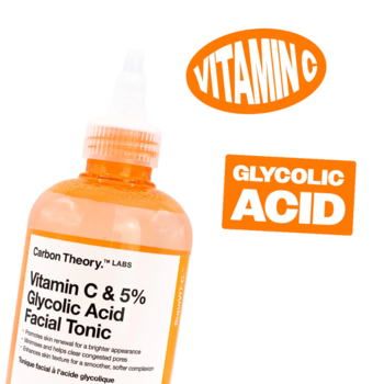 Tonik Carbon Theory Vitamin C & 5% Glycolic Acid w pomarańczowej butelce, z widocznymi hasłami VITAMIN C i GLYCOLIC ACID.