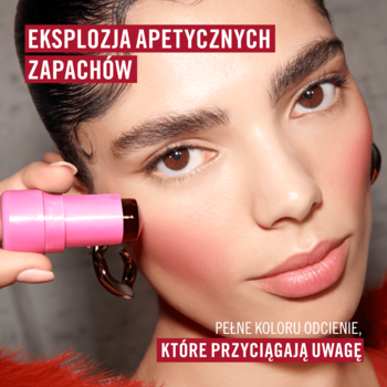 Kobieta z makijażem trzyma różowy tint Rimmel Jelly Crush, aplikując róż na policzek, podkreślając świeży look.