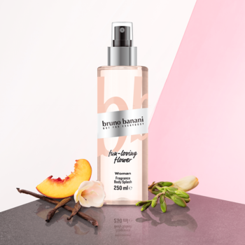 Mgiełka Bruno Banani fun-loving flower 250ml, brzoskwinia, wanilia i kwiaty obok butelki na różowym tle.