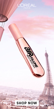 Różowozłoty tusz do rzęs L'Oréal Paris Air Volume Mega Mascara unosi się nad Paryżem, z wieżą Eiffla.