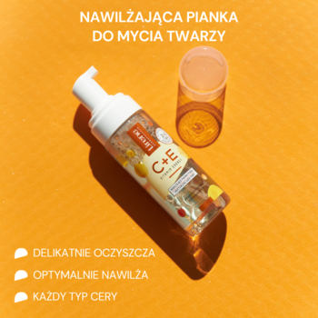 Nawilżająca pianka do mycia twarzy C+E Vitamin Energy, butelka z pompką na pomarańczowym tle, z ampułką.