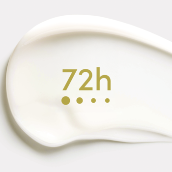 Fragment białego, kremowego antyperspirantu Dove Advanced Care ze złotym napisem "72h" na jasnym tle.