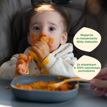 Bobovita Zupa jarzynowa dla niemowląt. Ubrudzone pomarańczowym puree dziecko rozszerza dietę. Tekst: 100% naturalne.